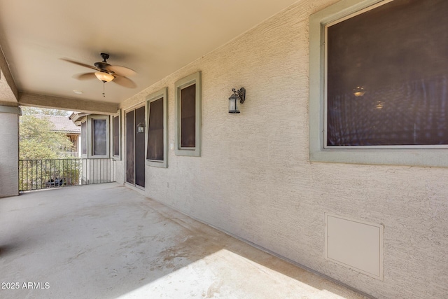 view of patio / terrace featuring ceiling fan