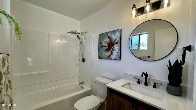 bathroom featuring shower / bathing tub combination, vanity, and toilet