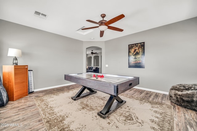 16917 W Sonora St, Goodyear, AZ 85338 - recreation room with a ceiling fan, wood finished floors, and arched walkways