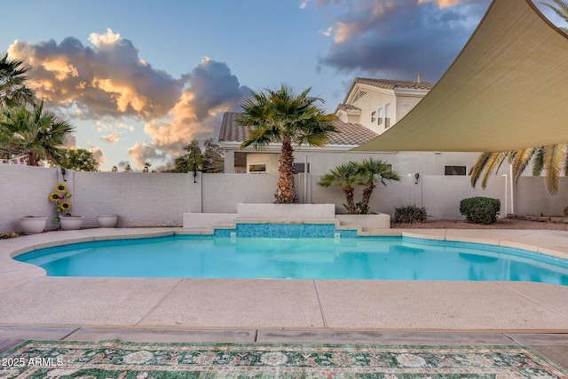 view of swimming pool featuring a fenced backyard and a fenced in pool