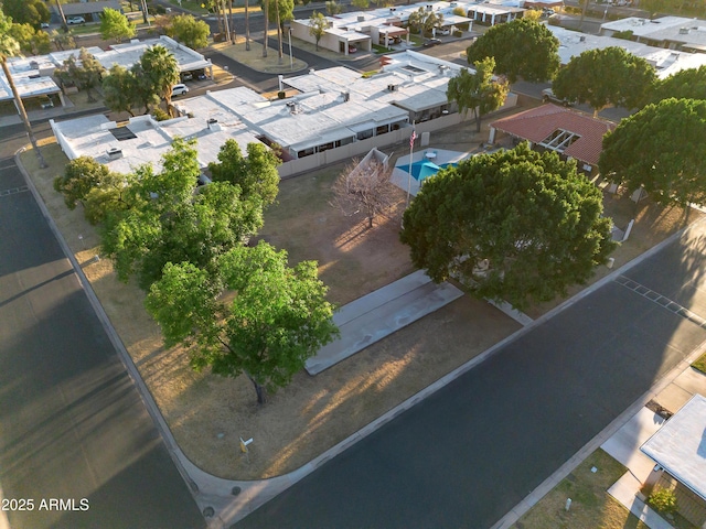 birds eye view of property with a residential view