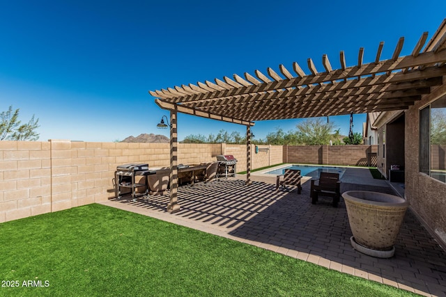 26264 N 74th Ln, Peoria, AZ 85383 - fenced backyard featuring a patio area, a pergola, and area for grilling