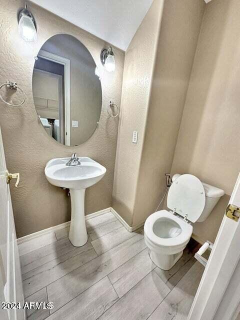 bathroom featuring toilet