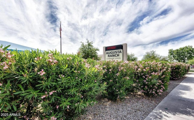 view of community sign