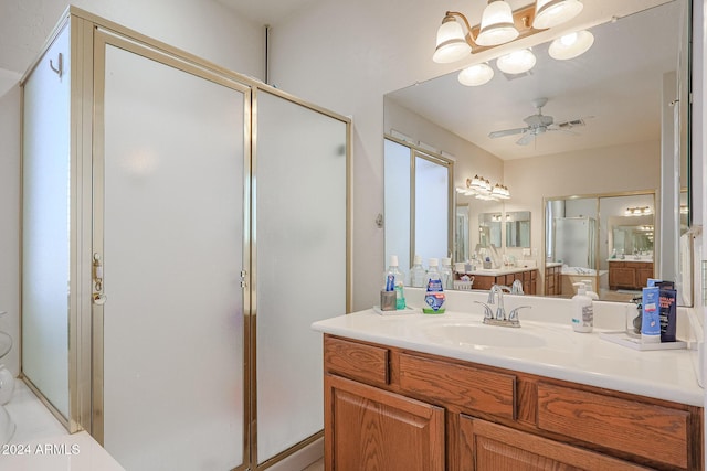 14586 W Columbus Ave, Goodyear, AZ 85395 - full bath with a stall shower, ceiling fan, and vanity