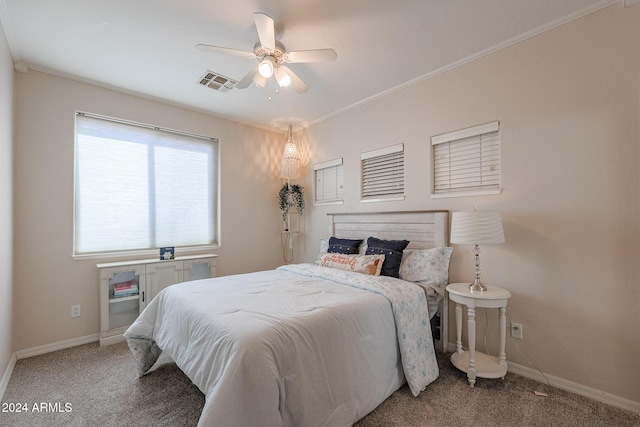 14586 W Columbus Ave, Goodyear, AZ 85395 - bedroom featuring carpet, baseboards, ceiling fan, and ornamental molding