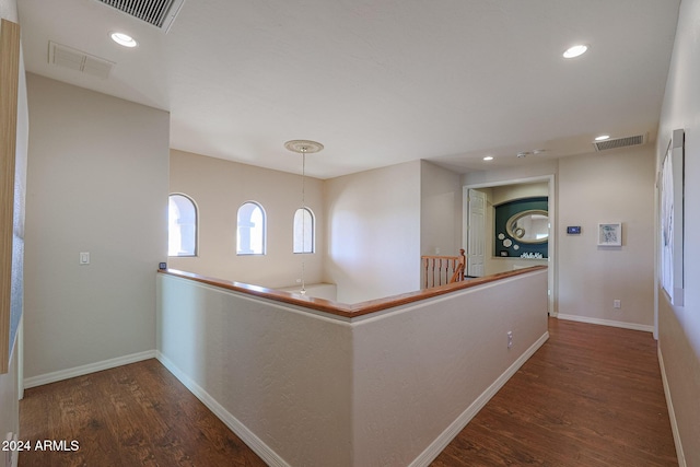 14586 W Columbus Ave, Goodyear, AZ 85395 - hall with wood finished floors, an upstairs landing, baseboards, and recessed lighting
