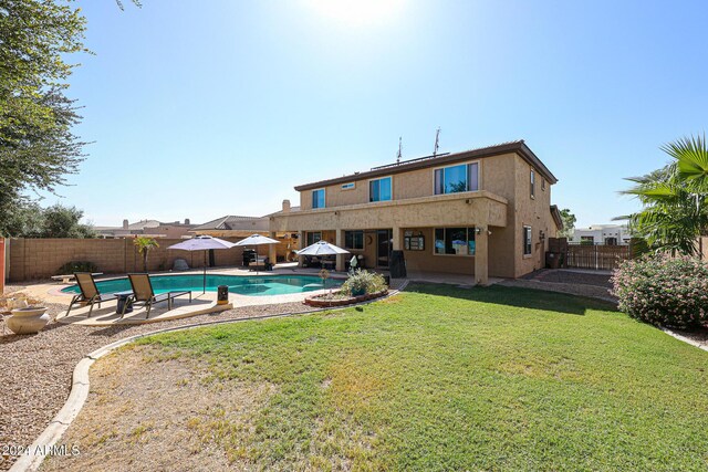 14586 W Columbus Ave, Goodyear, AZ 85395 - back of house featuring a patio area and stucco siding