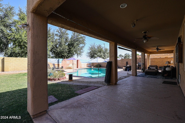 14586 W Columbus Ave, Goodyear, AZ 85395 - view of patio featuring a fenced backyard, ceiling fan, and outdoor lounge area