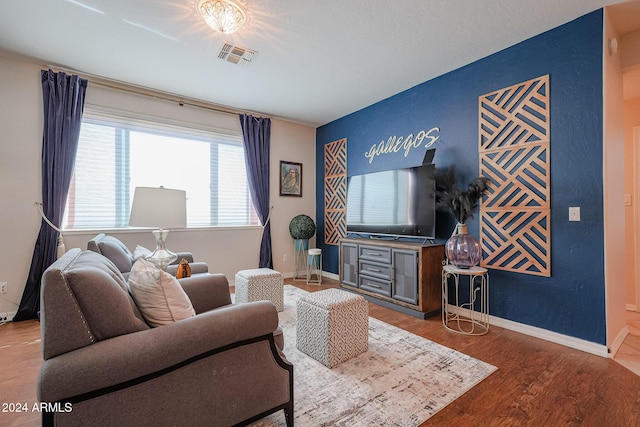 14586 W Columbus Ave, Goodyear, AZ 85395 - living room with wood finished floors and baseboards