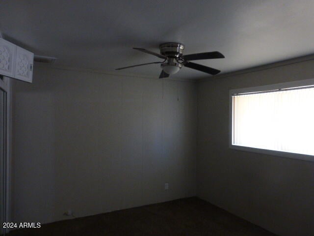 spare room featuring ceiling fan