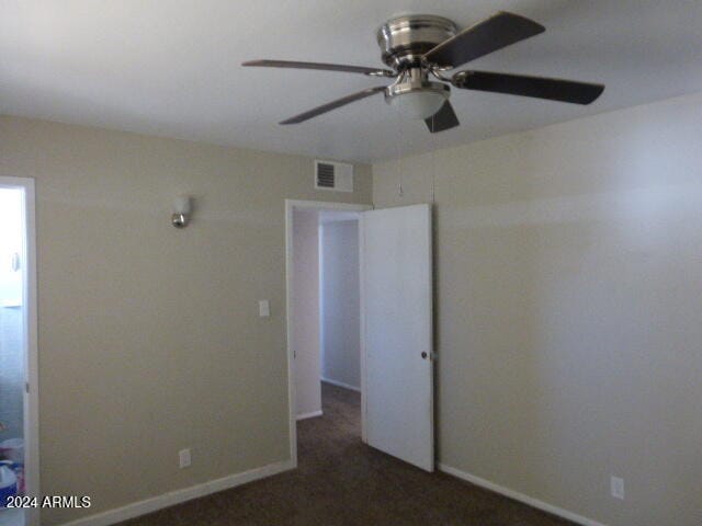 spare room with ceiling fan