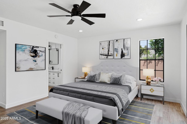 5756 N 78th Pl, Scottsdale, AZ 85250 - bedroom featuring wood finished floors, baseboards, recessed lighting, and ceiling fan