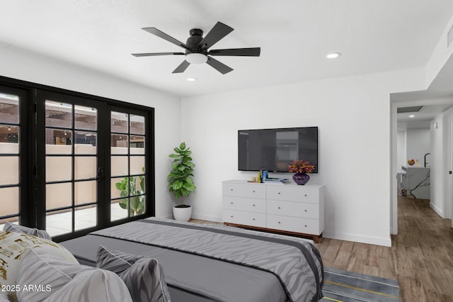 5756 N 78th Pl, Scottsdale, AZ 85250 - bedroom with wood finished floors, baseboards, recessed lighting, and ceiling fan