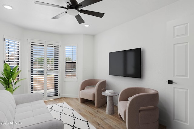 5756 N 78th Pl, Scottsdale, AZ 85250 - living area featuring ceiling fan, wood finished floors, baseboards, and recessed lighting