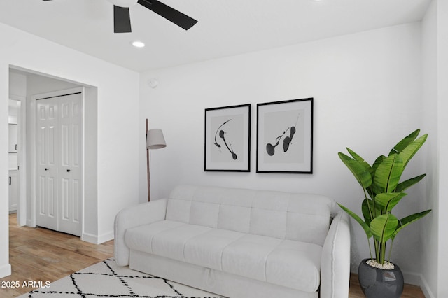 5756 N 78th Pl, Scottsdale, AZ 85250 - living room featuring a ceiling fan, wood finished floors, baseboards, and recessed lighting