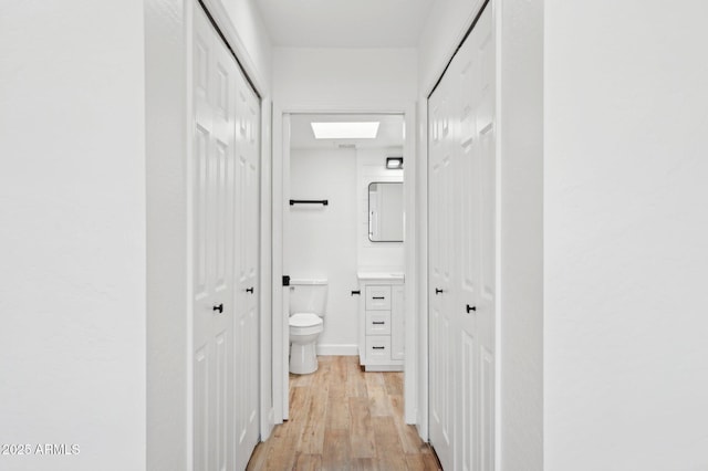5756 N 78th Pl, Scottsdale, AZ 85250 - hallway with light wood-type flooring