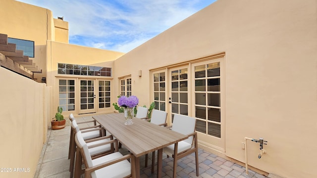 5756 N 78th Pl, Scottsdale, AZ 85250 - view of patio / terrace featuring french doors and outdoor dining space