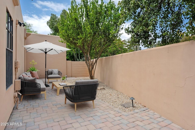 5756 N 78th Pl, Scottsdale, AZ 85250 - view of patio featuring a fenced backyard and outdoor lounge area