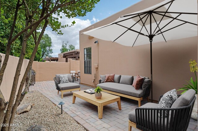 5756 N 78th Pl, Scottsdale, AZ 85250 - view of patio / terrace with an outdoor hangout area and fence