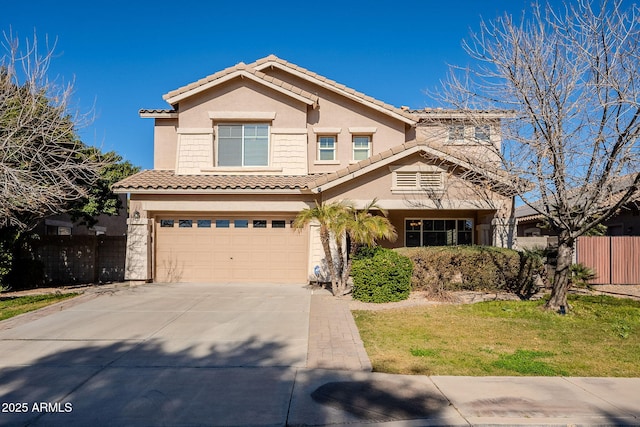 view of front of home with a garage and a front lawn