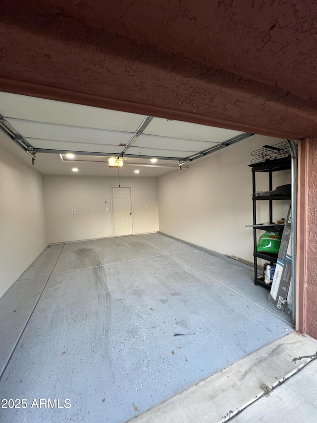 4040 N Weimer Pl Unit 4, Tucson, AZ 85719 - garage featuring recessed lighting and a garage door opener