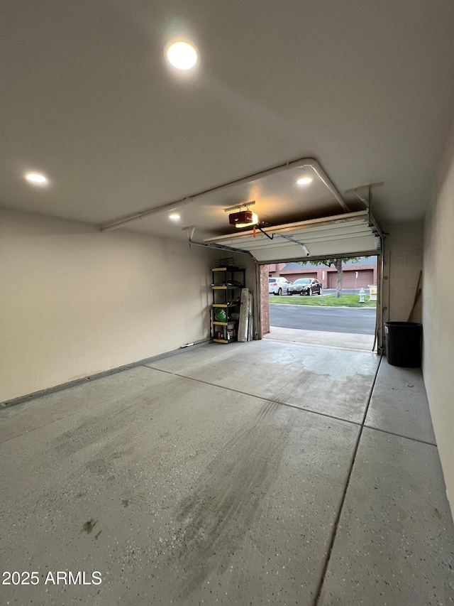 4040 N Weimer Pl Unit 4, Tucson, AZ 85719 - garage with recessed lighting and a garage door opener