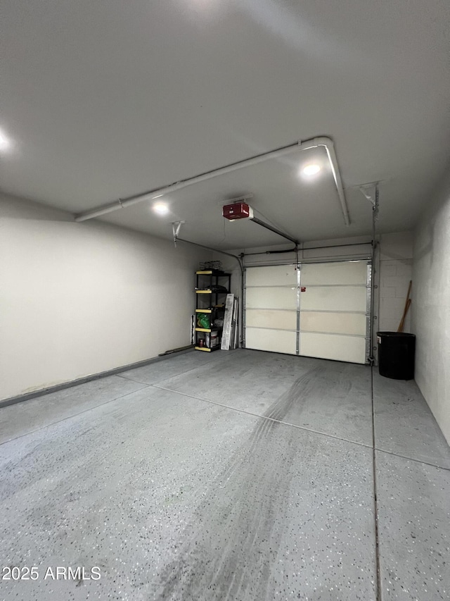 4040 N Weimer Pl Unit 4, Tucson, AZ 85719 - garage with a garage door opener
