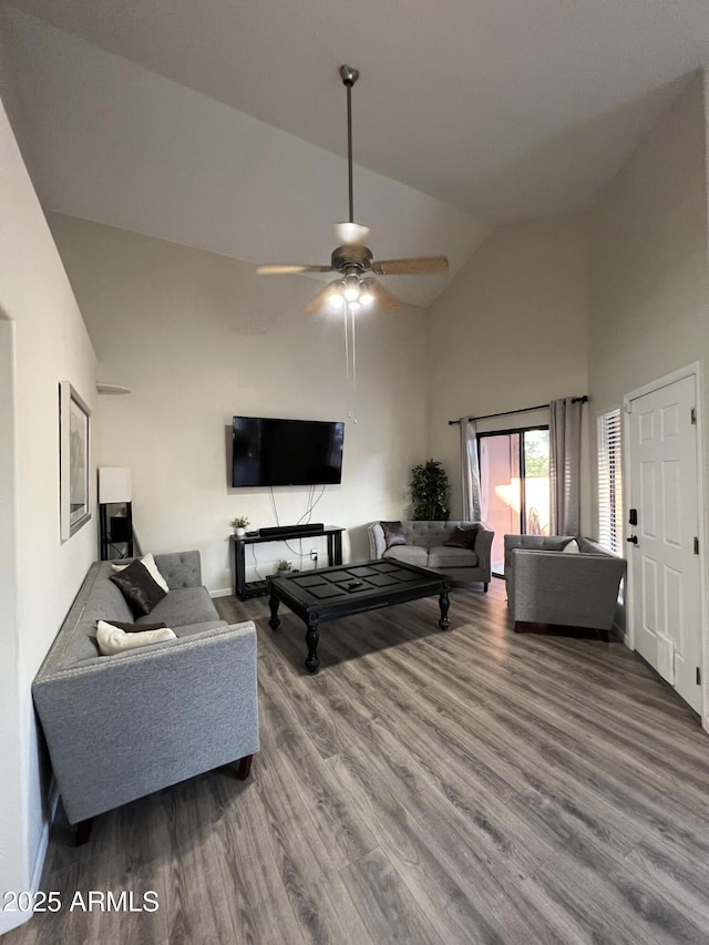 4040 N Weimer Pl Unit 4, Tucson, AZ 85719 - living area with baseboards, wood finished floors, a ceiling fan, and high vaulted ceiling
