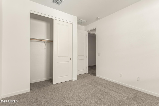 12369 W Marguerite Ave, Avondale, AZ 85323 - unfurnished bedroom featuring a closet, visible vents, baseboards, and carpet floors
