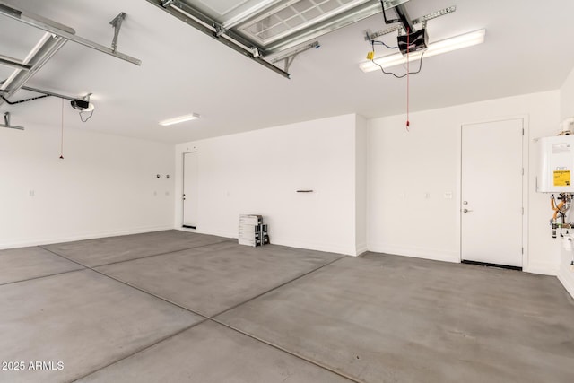 12369 W Marguerite Ave, Avondale, AZ 85323 - garage featuring a garage door opener and tankless water heater