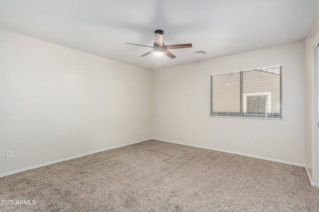 12376 W Hazelwood St, Avondale, AZ 85392 - spare room featuring carpet flooring, visible vents, baseboards, and a ceiling fan