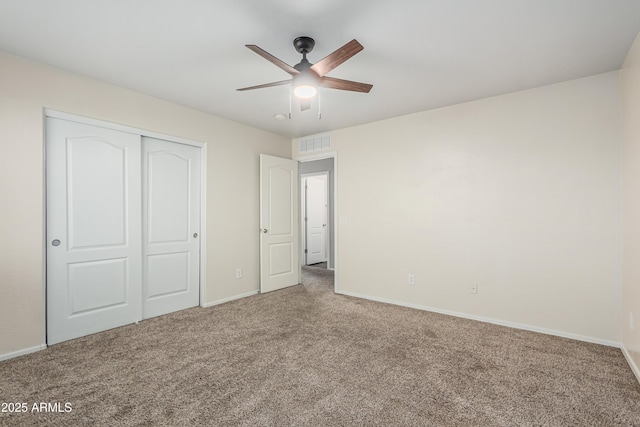 12376 W Hazelwood St, Avondale, AZ 85392 - unfurnished bedroom with a closet, baseboards, a ceiling fan, carpet floors, and visible vents