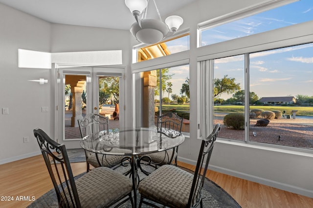 sunroom / solarium with a notable chandelier and plenty of natural light