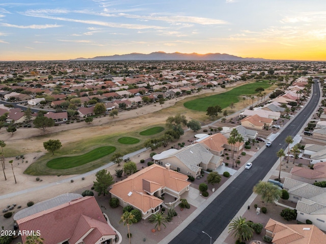 aerial view at dusk with a mountain view