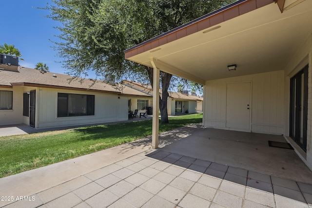 view of patio / terrace featuring a carport