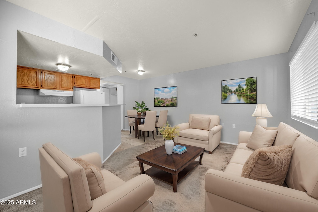 living room featuring light tile patterned floors