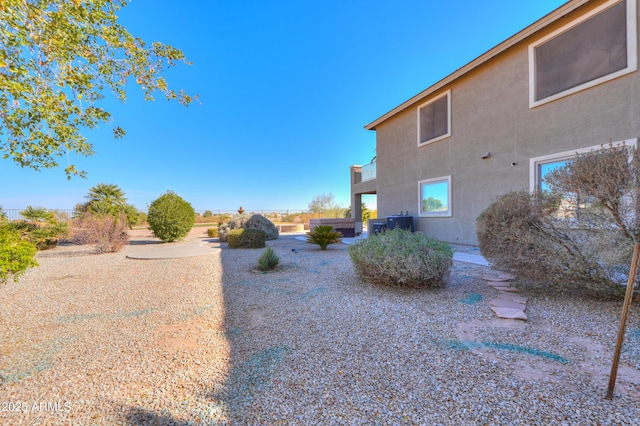 view of yard featuring central AC