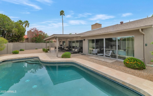 7806 E Via De La Entrada, Scottsdale, AZ 85258 - view of swimming pool with a patio area, a fenced backyard, and outdoor lounge area