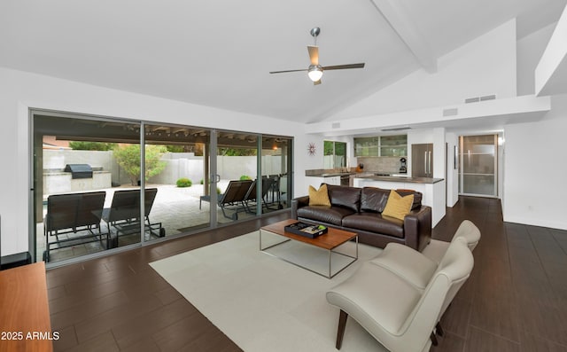 7806 E Via De La Entrada, Scottsdale, AZ 85258 - living room with a ceiling fan, beamed ceiling, dark wood-style floors, and high vaulted ceiling