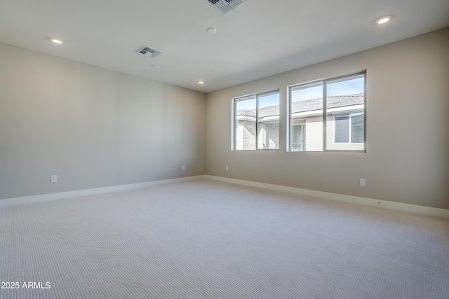 2121 W Sonoran Desert Dr Unit 43, Phoenix, AZ 85085 - empty room featuring light carpet, recessed lighting, and baseboards