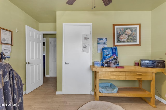 office area featuring ceiling fan and light hardwood / wood-style floors