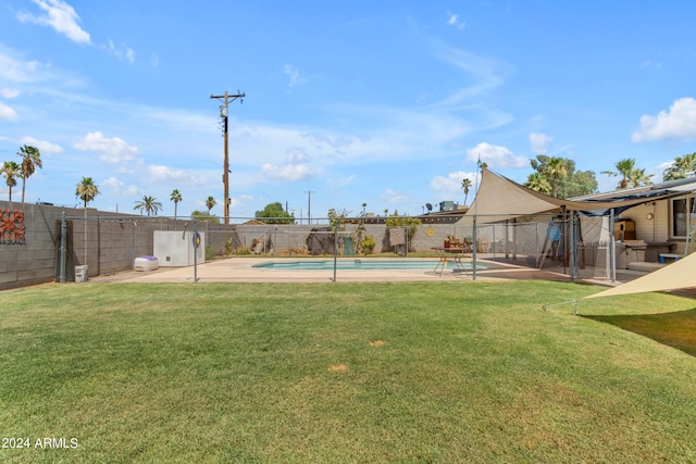 view of yard featuring a fenced in pool and a patio area