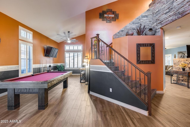 recreation room featuring billiards, ceiling fan, wood finished floors, and plenty of natural light