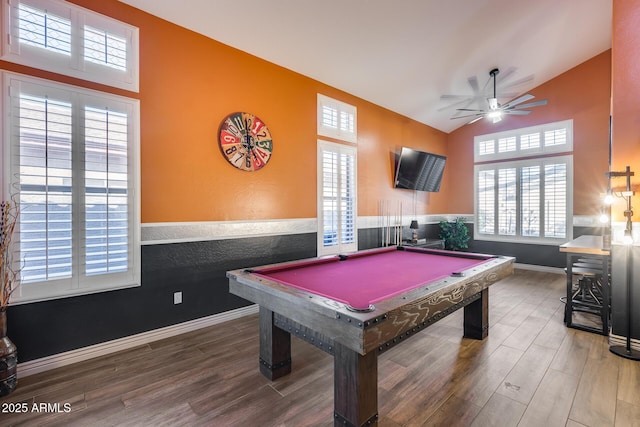 playroom featuring a wealth of natural light, vaulted ceiling, and wood finished floors