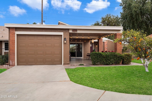 view of front facade with a front lawn and a garage