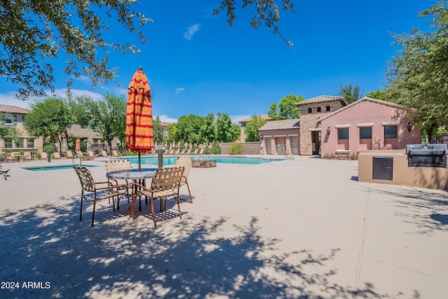 view of pool with a patio area