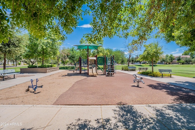 view of playground with a yard