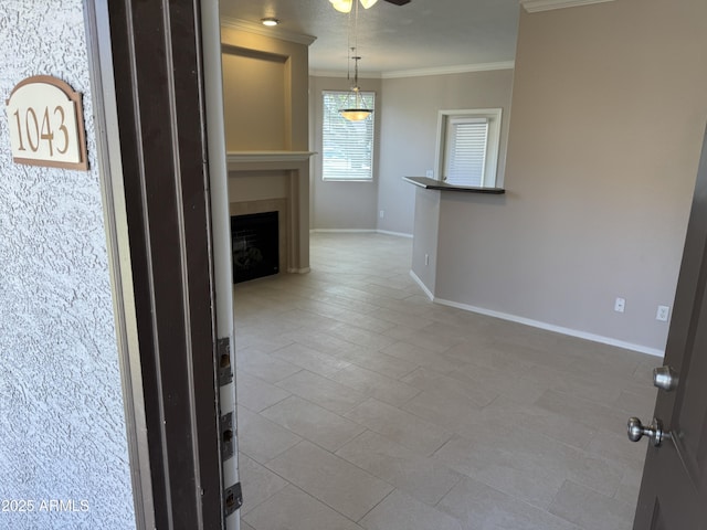 1941 S Pierpont Dr Unit 1043, Mesa, AZ 85206 - unfurnished living room featuring crown molding, a ceiling fan, a fireplace, and tile patterned floors
