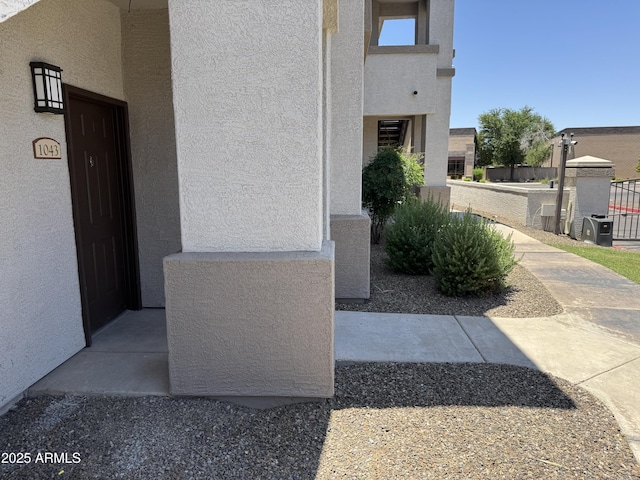 1941 S Pierpont Dr Unit 1043, Mesa, AZ 85206 - doorway to property with stucco siding